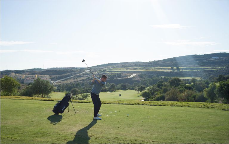 player-swinging-in-sunlight